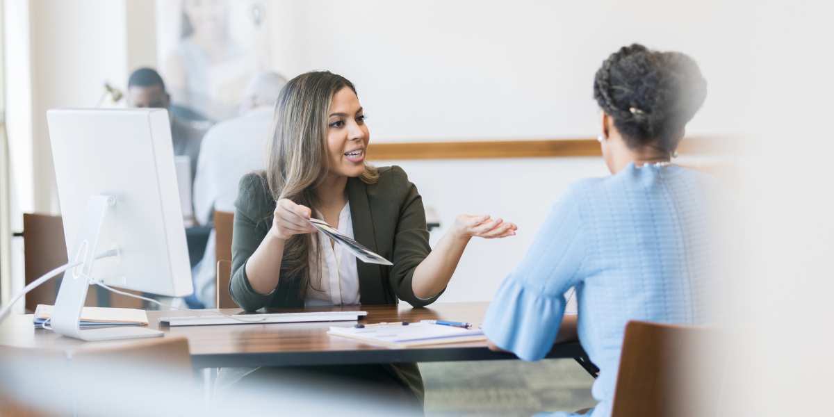 2 people meeting at an office